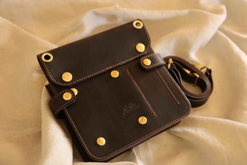 Scissor case with camel stitching