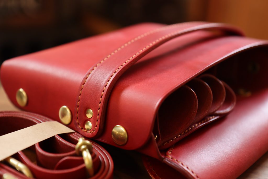 Red leather with camel stitching