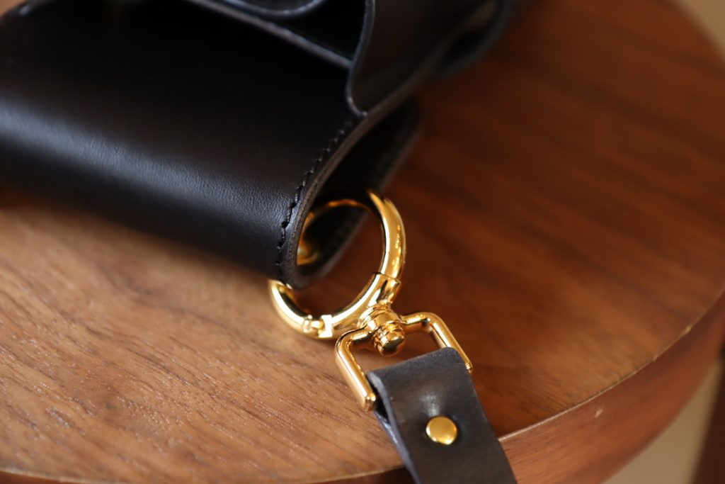 Belt part of the -03 s- scissor case using custom hardware